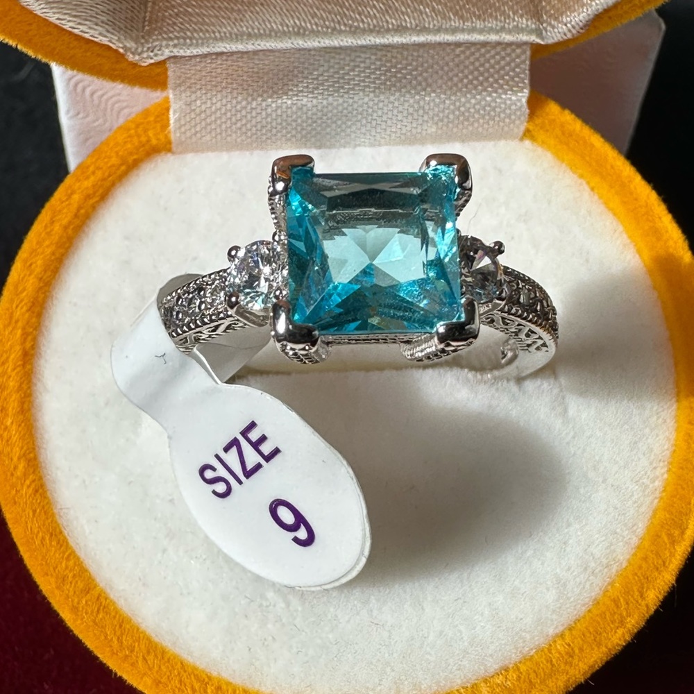 RBP 2361: Lab created Aqua Blue Topaz and White Topaz on triple plated rhodium